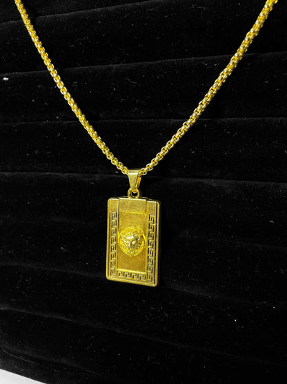 Gold medusa pendant